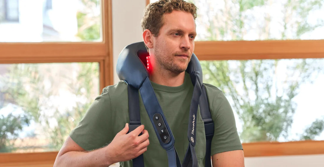Man using ThermNeck and Upper Back device to treat tech neck